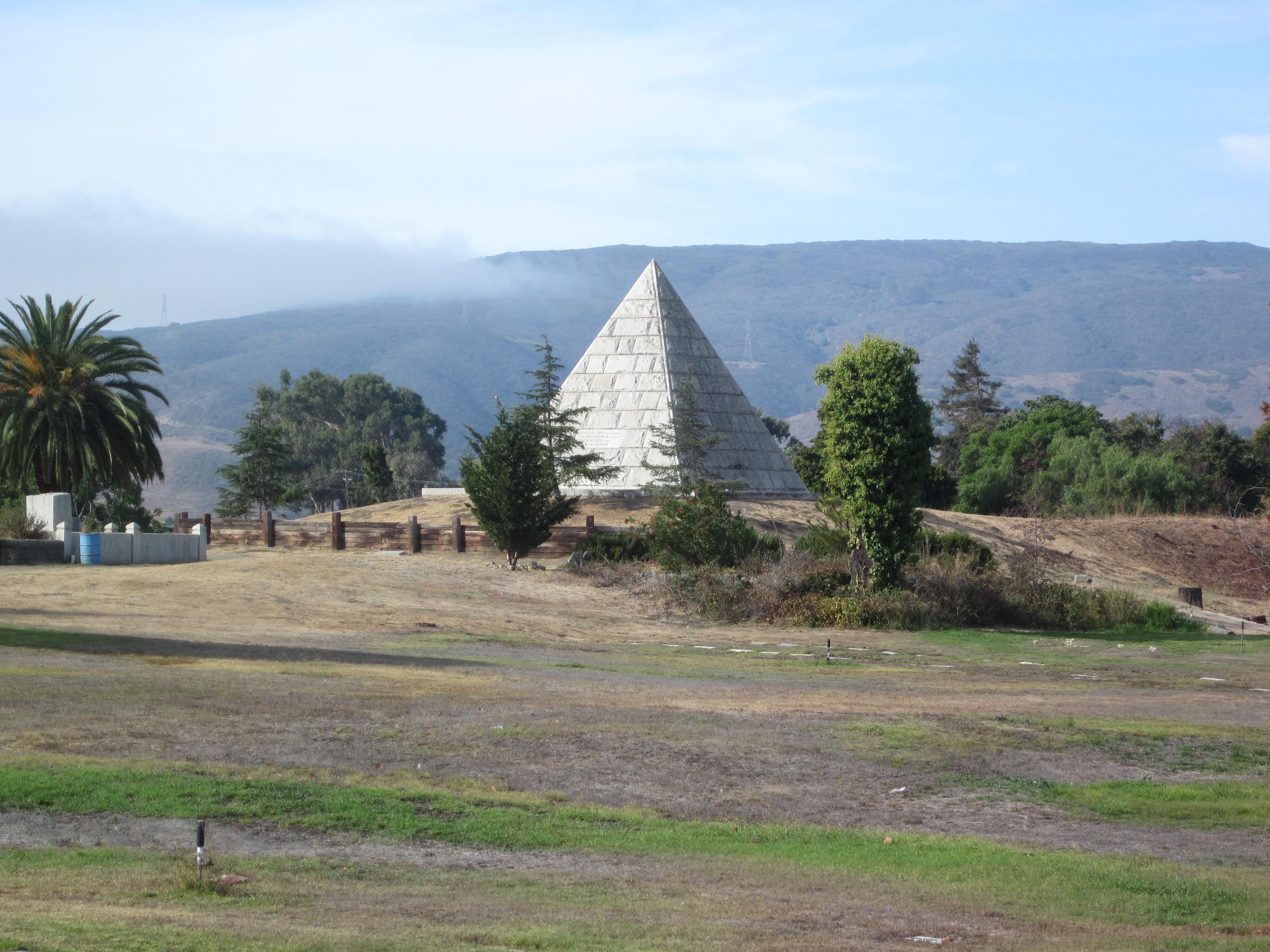 Must have thought they were long lost members of the Egyptian Dynasty. Why else would you have a pyramid for a tomb/headstone?